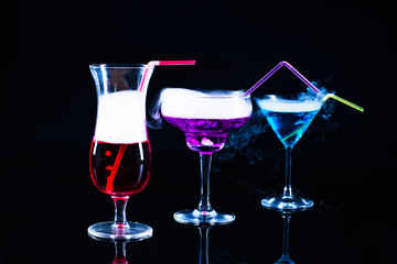 photo of a colored drink with smoke