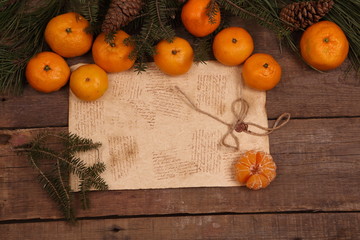 New Year's still-life with tangerines and a fur-tree branch