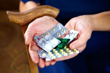 Hands with pills