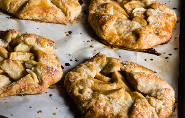 Fresh baked apple tarts with sliced apples