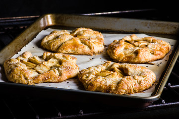 Apple tarts coming out of the oven