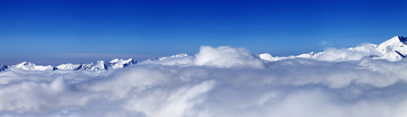 Naklejka premium Panorama of mountains under clouds at nice day