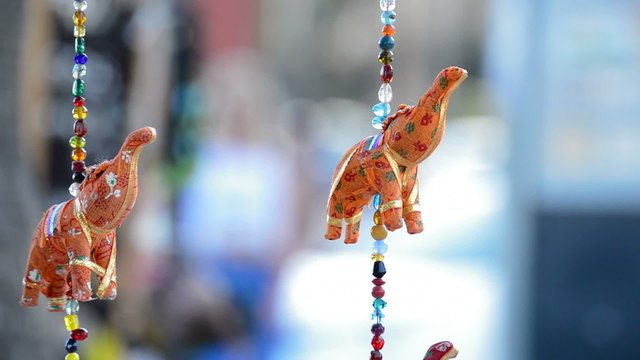Indian elephants hanging in hawker stall craft
