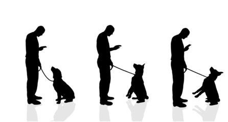 Obraz premium Vector silhouette of a man with a dog.