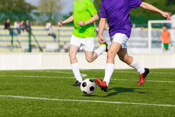 football soccer game. footballers in action. running players
