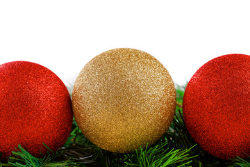 Christmas balls with fir-tree branches on wooden background