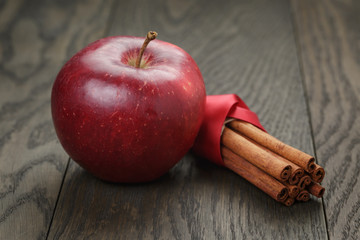 red ripe apple and cinnamon