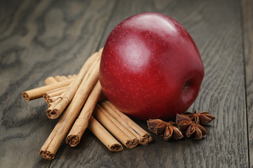 red ripe apple and cinnamon