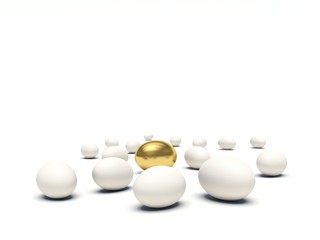 White eggs lying on the ground with golden egg among them.