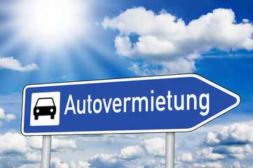 Obraz premium Wegweiser mit Autovermietung
