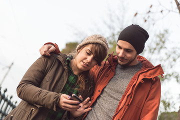 Young couple with the smartphone