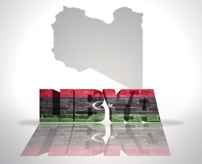 Word Libya on a map background