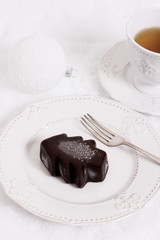 Ice chocolate dessert in form of Christmas tree