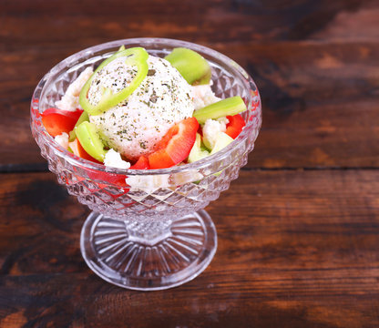 Cottage cheese with vegetables in piyala on wooden background