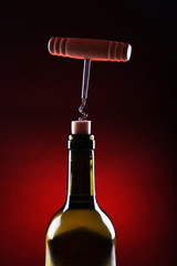 Bottle opener close-up, on dark color background