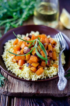 Stewed pumpkin with millet and rosemary