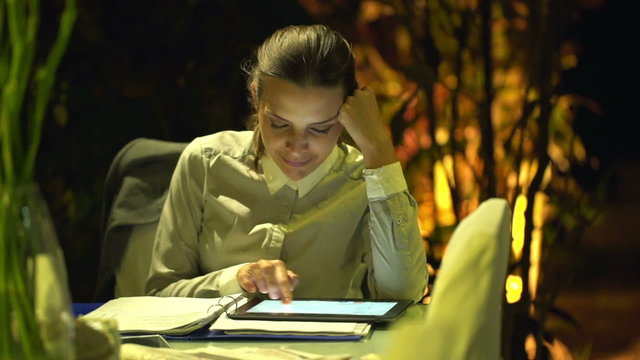 Tired businessman yawning and sleeping over documents