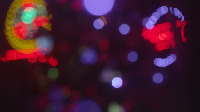 Christmas holidays lights blinking out of focus background