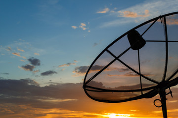 Satellite dishes on sunset