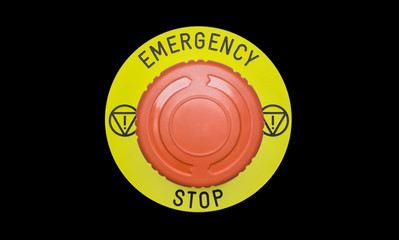 Red emergency button on black panel