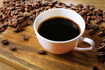 Cup of coffee on wooden table