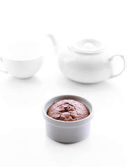 Hot chocolate pudding with fondant centre on white table