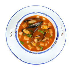Tasty mussel soup isolated on white