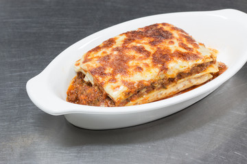 italian lasagna on white plate