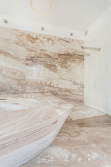 Fototapeta na wymiar Marble floor and wall in bathroom