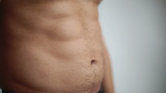 Embossed torso turns into a paunchy belly man