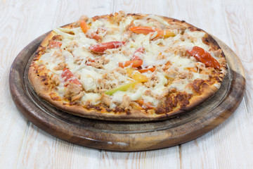 Delicious pizza on wood