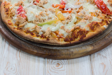 Delicious pizza on wood table