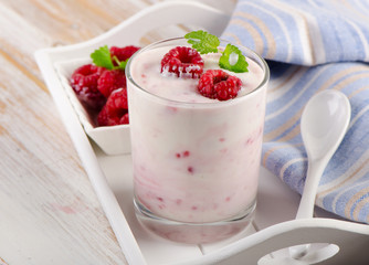 Raspberry yogurt in  glass.