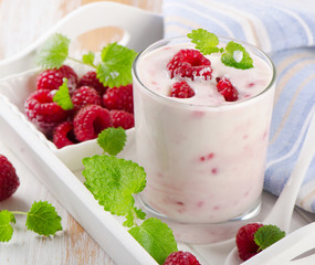 Fresh raspberry yogurt in  glass.