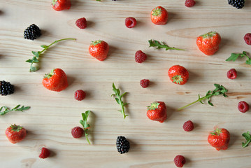 Fototapeta na wymiar Aerial photo of raspberries, strawberries and blackberries