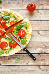 Thin pizza with mozzarella cheese