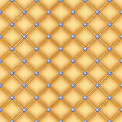 Seamless golden quilted background with pins.