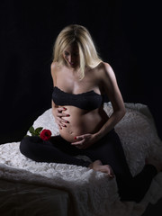 Pregnant woman in bed