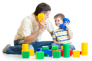 father and kid boy role-playing together