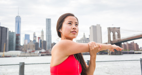 Asian Girl Doing Stretching Exercises in New York
