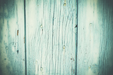 Fototapeta na wymiar Porte en bois avec peinture écaillée