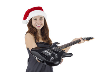 Fototapeta premium Woman giving electric guitar as a Christmas gift