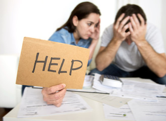 stress couple at home in bad financial situation asking for help