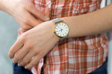 Woman hand with a watch