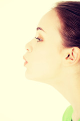 Attractive woman's profile. Closeup.