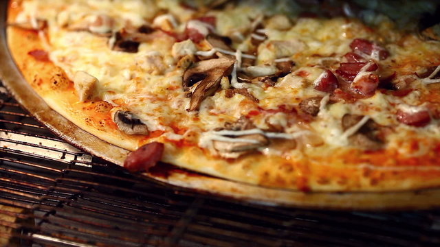 Traditional Italian pizza baking in oven