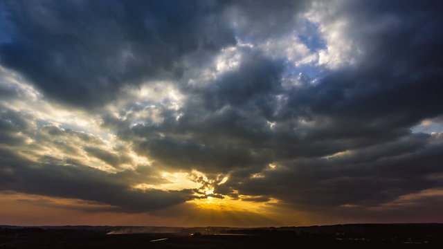 The picturesque sunset (sunrise) with clouds, wide angle view