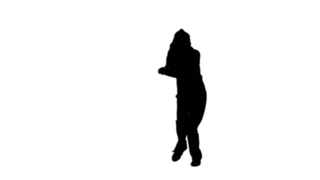 Woman dancing in black silhouette