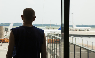 Man waits at the airport