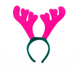 Pair of toy reindeer horns. Isolated on a white background.